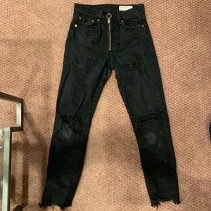 Black ripped jeans with cool zipper